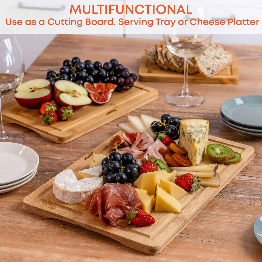 https://blauke.com/cdn/shop/products/BambooCuttingBoardSetof3_OrganicKitchenChoppingBoardsforMeatCheese_Vegetables_HeavyDutyBambooCuttingBoardswithJuiceGrooves_Handles_WoodenServingTray_CarvingBoard-3.jpg?v=1678542604&width=1090